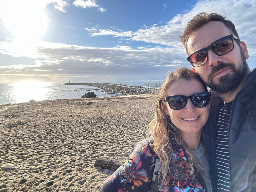 Photo of two people in the beach